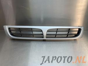 Used Grille Toyota Carina E (T19) 1.6 16V Lean Burn Price € 14,95 Margin scheme offered by Japoto Parts B.V.