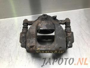 Used Front brake calliper, left Toyota Avensis Wagon (T27) 2.0 16V D-4D-F Price € 49,95 Margin scheme offered by Japoto Parts B.V.
