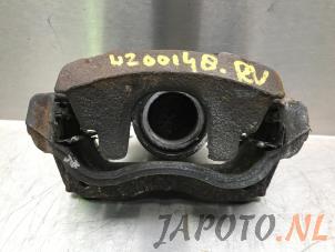Used Front brake calliper, right Toyota Avensis Wagon (T27) 2.0 16V D-4D-F Price € 49,95 Margin scheme offered by Japoto Parts B.V.