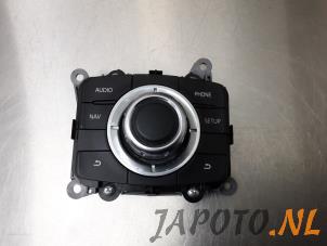 Usagé Panneau de commandes navigation Mazda CX-5 (KE,GH) 2.2 SkyActiv-D 16V 2WD Prix € 124,95 Règlement à la marge proposé par Japoto Parts B.V.