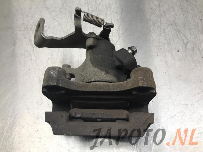 Rear brake calliper, right from a Mazda CX-5 (KE,GH) 2.2 SkyActiv-D 16V 2WD 2014