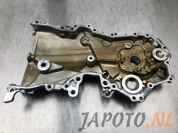 Timing cover from a Toyota Yaris III (P13) 1.5 16V Hybrid 2017