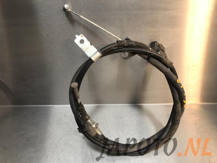 Cable de freno de mano de un Mazda 3 (BM/BN) 2.0 SkyActiv-G 120 16V 2016