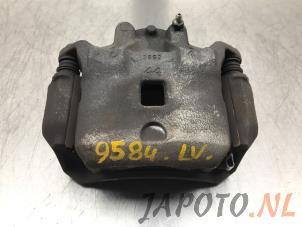 Used Front brake calliper, left Nissan Juke (F15) 1.6 16V Price € 39,99 Margin scheme offered by Japoto Parts B.V.