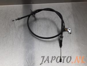 Używane Linka hamulca recznego Mazda 2 (DJ/DL) 1.5 SkyActiv-G 90 Cena € 24,95 Procedura marży oferowane przez Japoto Parts B.V.