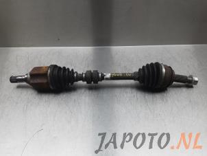 Usagé Arbre de transmission avant gauche Nissan Qashqai (J11) 1.2 DIG-T 16V Prix € 74,95 Règlement à la marge proposé par Japoto Parts B.V.