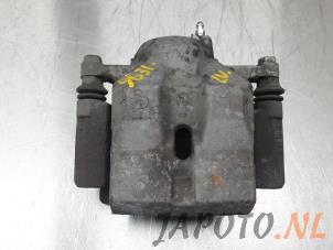 Used Front brake calliper, left Lexus CT 200h 1.8 16V Price € 49,95 Margin scheme offered by Japoto Parts B.V.