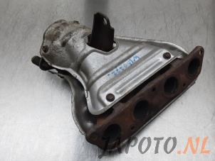 Used Exhaust manifold Toyota Corolla (E12) Price € 39,95 Margin scheme offered by Japoto Parts B.V.