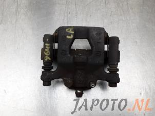 Used Rear brake calliper, left Nissan Juke (F15) 1.6 16V Price € 39,99 Margin scheme offered by Japoto Parts B.V.