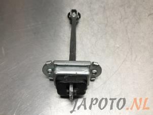 Used Rear door stop 4-door, right Toyota Corolla (E21/EA1/EH1) 1.8 16V Hybrid Price € 29,95 Margin scheme offered by Japoto Parts B.V.