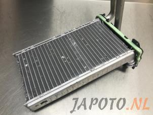 Usados Radiador de calefactor Toyota Aygo (B40) 1.0 12V VVT-i Precio € 34,95 Norma de margen ofrecido por Japoto Parts B.V.