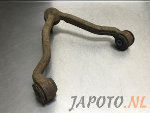 Used Front upper wishbone, right Ssang Yong Rexton 2.7 Xdi RX/RJ 270 16V Price € 34,95 Margin scheme offered by Japoto Parts B.V.