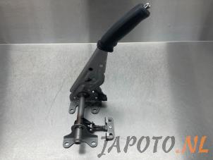 Used Parking brake lever Toyota Land Cruiser (J15) 2.8 D-4D 16V Price € 42,29 Inclusive VAT offered by Japoto Parts B.V.