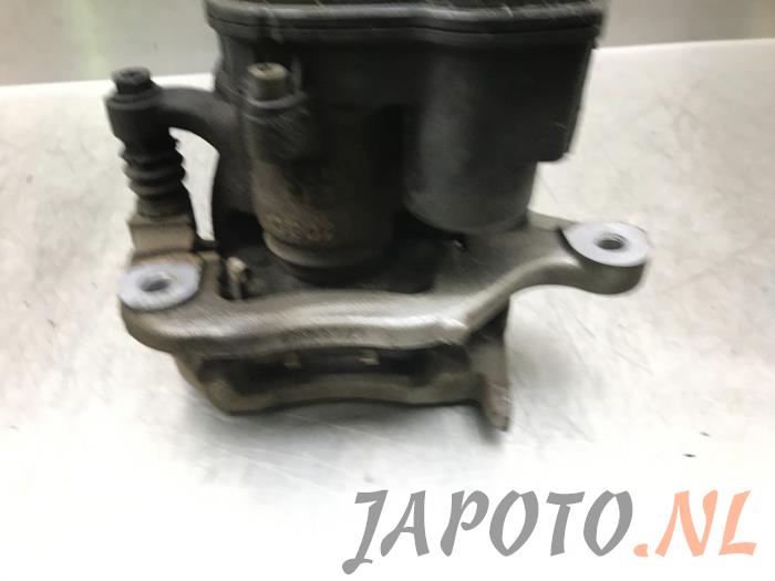 Gebrauchte Bremszange links hinten Nissan Qashqai (J11) 1.5 dCi DPF Preis € 62,95 Margenregelung angeboten von Japoto Parts B.V.