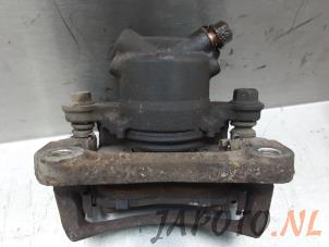Used Front brake calliper, left Daihatsu Terios (J2) 1.5 16V DVVT 4x2 Euro 4 Price € 34,95 Margin scheme offered by Japoto Parts B.V.