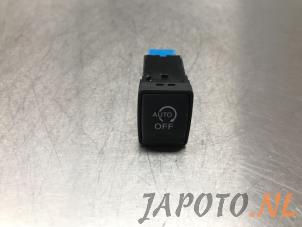 Used Start/stop switch Nissan Note (E12) 1.2 68 Price € 9,95 Margin scheme offered by Japoto Parts B.V.