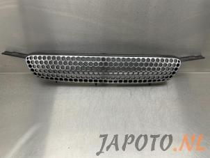 Used Grille Toyota Corolla (E11) 1.6 16V Price € 24,95 Margin scheme offered by Japoto Parts B.V.