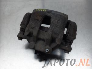 Used Front brake calliper, right Kia Rio III (UB) 1.2 CVVT 16V Price € 40,00 Margin scheme offered by Japoto Parts B.V.