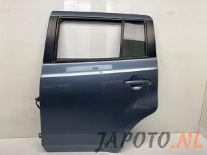 Usagé Porte arrière gauche Daihatsu Materia 1.3 16V Prix € 150,00 Règlement à la marge proposé par Japoto Parts B.V.