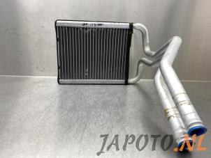Used Heating radiator Kia Rio III (UB) 1.2 CVVT 16V Price € 34,95 Margin scheme offered by Japoto Parts B.V.