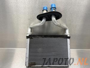 Usados Radiador de calefactor Daihatsu Trevis 1.0 12V DVVT Precio € 39,95 Norma de margen ofrecido por Japoto Parts B.V.