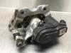 Rear brake calliper, left from a Toyota Yaris IV (P21/PA1/PH1) 1.5 12V Hybrid 2021