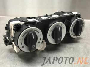Usados Panel de control de calefacción Mitsubishi Colt (Z2/Z3) 1.3 16V Precio € 19,95 Norma de margen ofrecido por Japoto Parts B.V.
