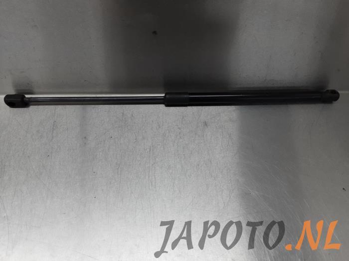 Rear gas strut, right from a Suzuki Swift (ZA/ZC/ZD) 1.2 16V 2011