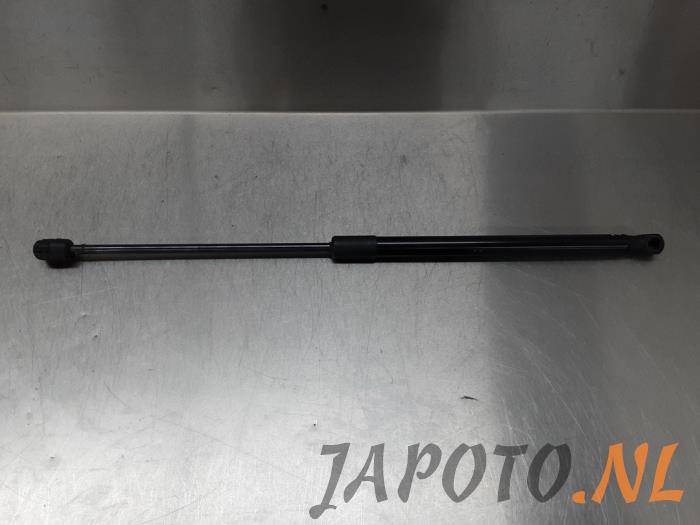 Rear gas strut, right from a Suzuki Swift (ZA/ZC/ZD) 1.2 16V 2011
