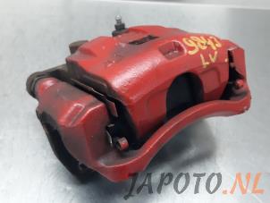 Używane Zacisk hamulcowy lewy przód Suzuki Swift (ZA/ZC/ZD) 1.2 16V Cena € 34,95 Procedura marży oferowane przez Japoto Parts B.V.