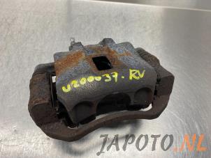 Used Front brake calliper, right Kia Rio II (DE) 1.4 16V Price € 34,95 Margin scheme offered by Japoto Parts B.V.