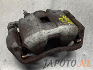 Used Front brake calliper, right Honda Jazz (GE6/GE8/GG/GP) 1.3 VTEC 16V Hybrid Price € 45,00 Margin scheme offered by Japoto Parts B.V.