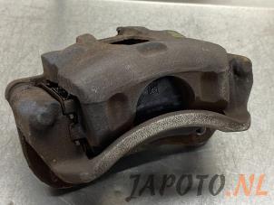 Used Front brake calliper, left Hyundai i20 1.2i 16V Price € 49,00 Margin scheme offered by Japoto Parts B.V.