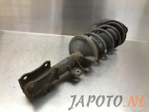 Used Front shock absorber rod, left Suzuki Grand Vitara II (JT) 1.6 16V Price € 40,00 Margin scheme offered by Japoto Parts B.V.