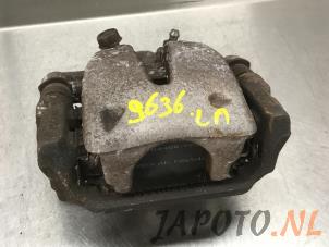 Używane Zacisk hamulcowy lewy tyl Toyota Avensis Wagon (T25/B1E) 2.0 16V D-4D-F Cena € 34,95 Procedura marży oferowane przez Japoto Parts B.V.