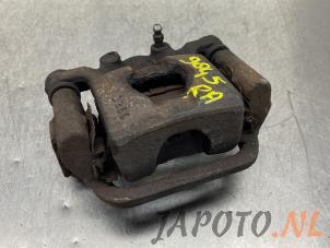 Used Rear brake calliper, right Nissan Qashqai (J10) 1.6 16V Price € 29,95 Margin scheme offered by Japoto Parts B.V.