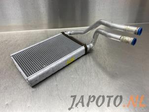 Usados Radiador de calefactor Suzuki Swift (ZA/ZC/ZD1/2/3/9) 1.3 VVT 16V Precio € 40,00 Norma de margen ofrecido por Japoto Parts B.V.