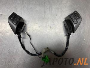 Used Steering wheel mounted radio control Subaru Forester (SG) 2.0 16V X Price € 49,95 Margin scheme offered by Japoto Parts B.V.