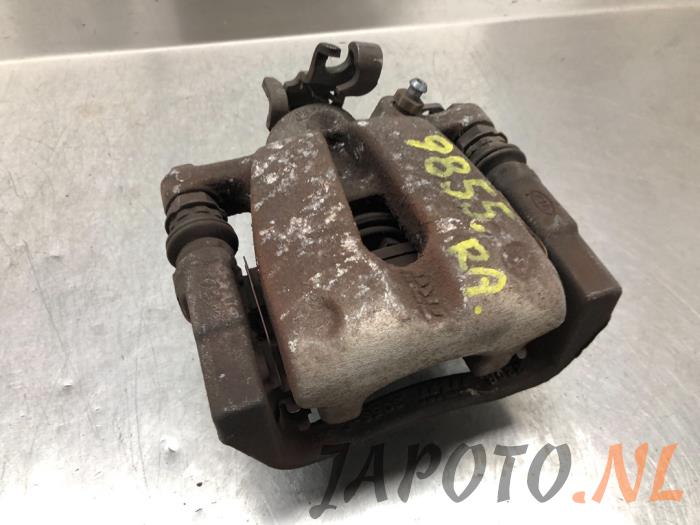 Gebrauchte Bremszange rechts hinten Kia Venga 1.4 CVVT 16V Preis € 20,95 Margenregelung angeboten von Japoto Parts B.V.
