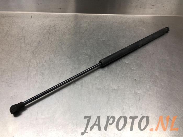 Rear gas strut, left from a Mitsubishi Space Star (A0) 1.0 12V 2019