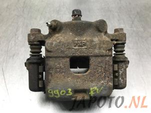 Used Front brake calliper, right Daihatsu Cuore (L251/271/276) 1.0 12V DVVT Price € 39,95 Margin scheme offered by Japoto Parts B.V.