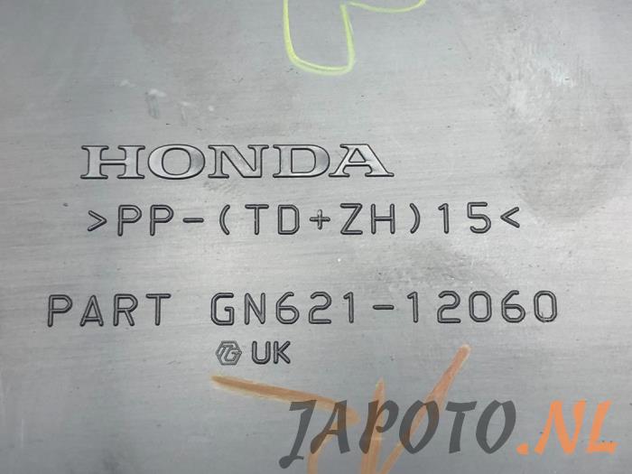 Compartiment de rangement d'un Honda Civic (FK1/2/3) 1.4i VTEC 16V 2013