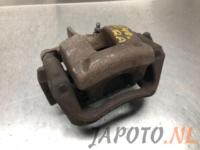 Rear brake calliper, right from a Toyota Verso 2.2 16V D-CAT 2011