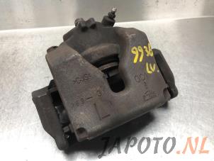 Used Front brake calliper, left Honda Civic (FK1/2/3) 1.4i VTEC 16V Price € 74,99 Margin scheme offered by Japoto Parts B.V.
