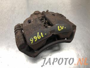 Used Front brake calliper, left Mitsubishi Colt CZC 1.5 16V Price € 39,95 Margin scheme offered by Japoto Parts B.V.