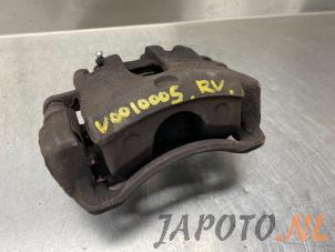 Usagé Etrier de frein (pince) avant droit Kia Rio III (UB) 1.1 CRDi VGT 12V Prix € 40,00 Règlement à la marge proposé par Japoto Parts B.V.