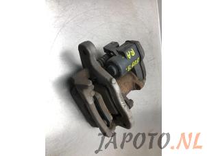 Used Rear brake calliper, right Nissan Qashqai (J11) 1.3 DIG-T 140 16V Price € 59,95 Margin scheme offered by Japoto Parts B.V.