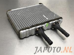 Used Heating radiator Nissan Almera (N16) 1.8 16V Price € 35,00 Margin scheme offered by Japoto Parts B.V.