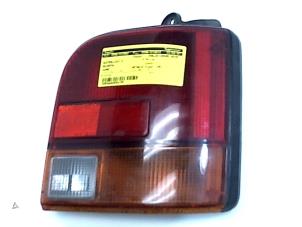 Usagé Feu arrière droit Daihatsu Cuore (L251/271/276) 850,Domino Prix € 19,95 Règlement à la marge proposé par Japoto Parts B.V.