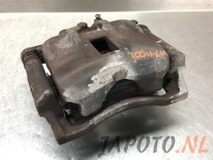 Used Front brake calliper, left Honda Civic (FK/FN) 1.4 i-Dsi Price € 65,00 Margin scheme offered by Japoto Parts B.V.